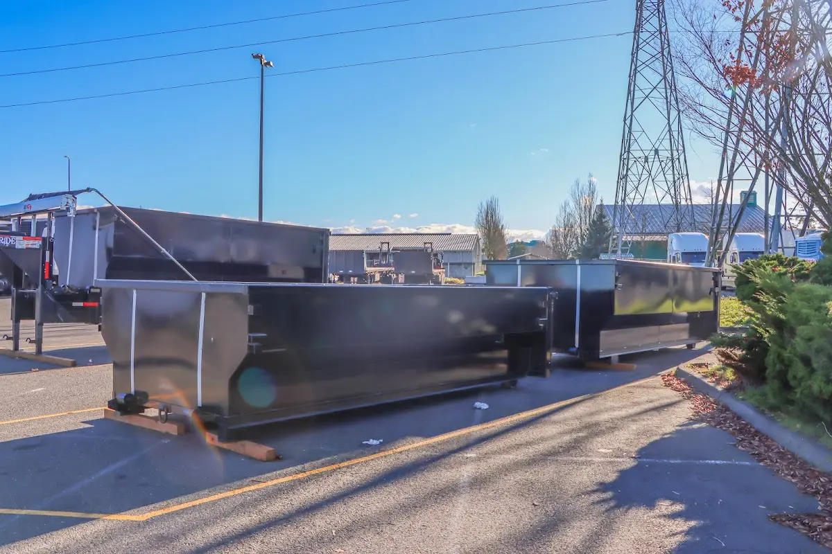 Roll-off dumpster ready for waste disposal at job site for Residential Dumpster Rental in Kenner